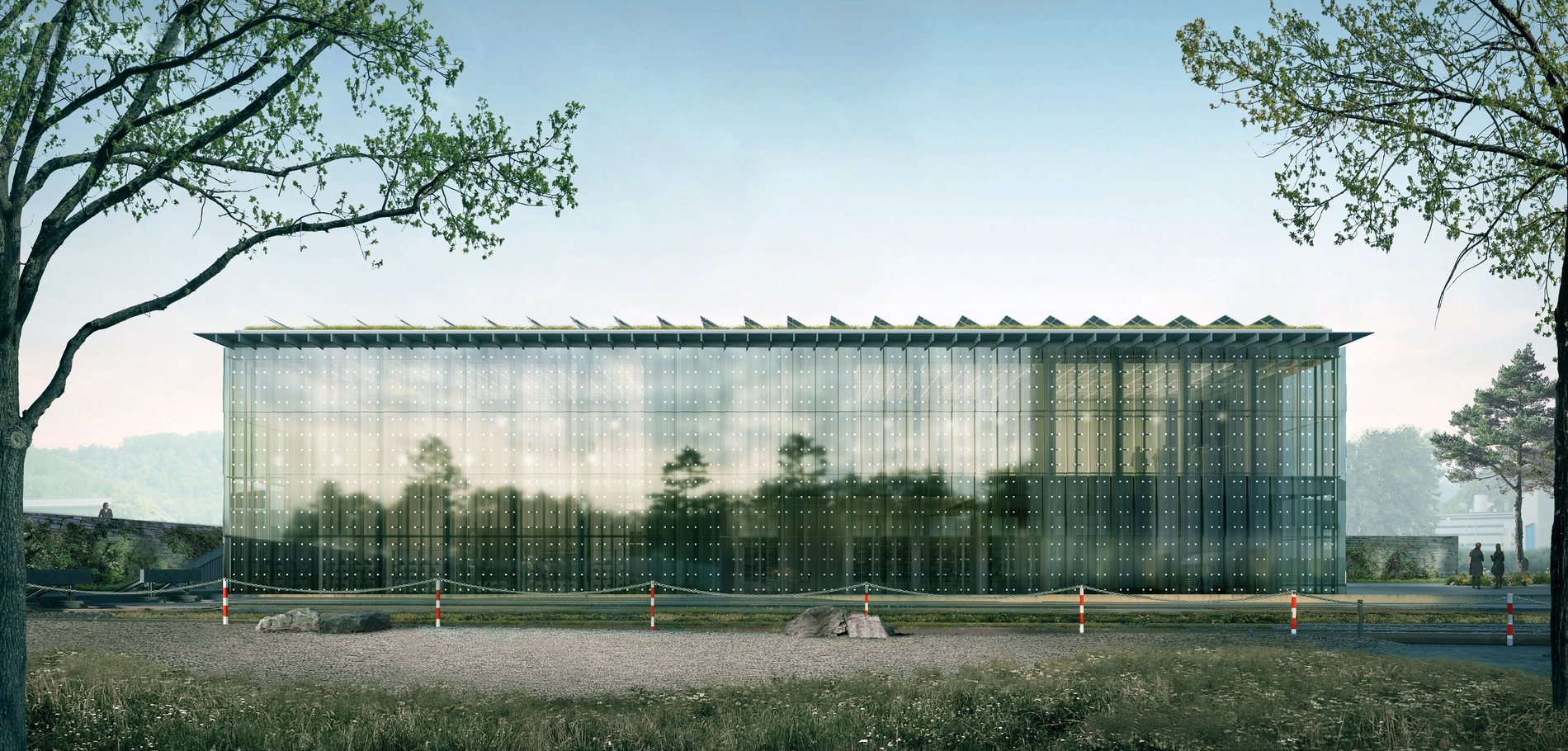 Holcim Visitor Workshop - exterior view of the semi-transparent photovoltaic glass pavilion in a wooded landscape